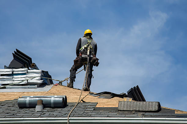 Professional Roofing technician working in Ninnekah, OK
